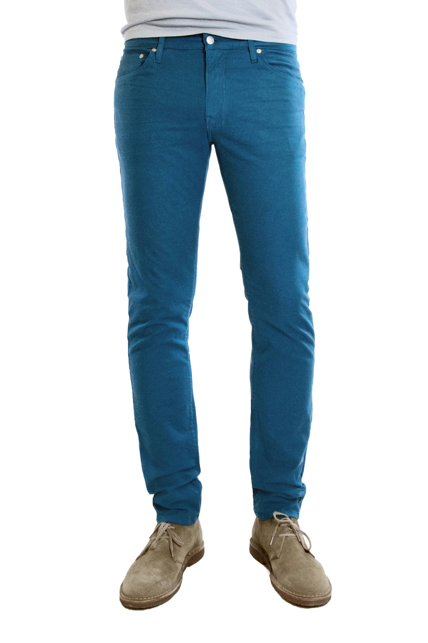 S.M.N Studio's Hunter in Marine Men's Twill Pants. A slim stretch comfort twill pant in a teal color 