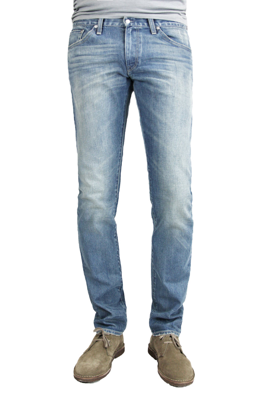 S.M.N Studio's Finn in Western Men's Jeans - Tapered Slim Comfort Stretch Denim in vintage light wash denim accented with fading and whiskering