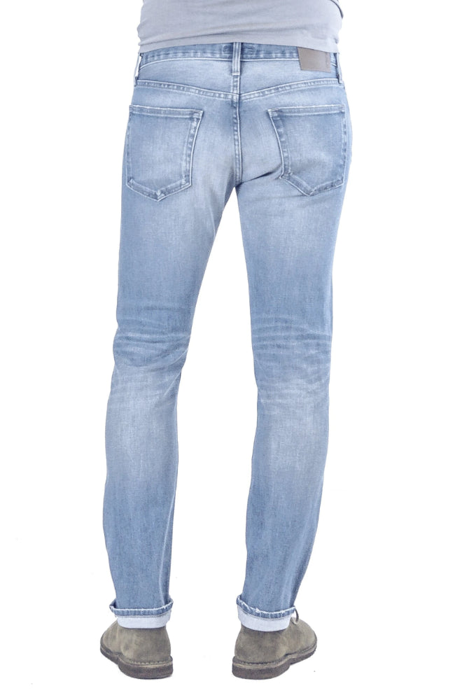 Back of S.M.N Studio's Finn in Vista Men's Jeans - Tapered Slim stretch selvedge jeans in a light blue wash made in premium Japanese denim