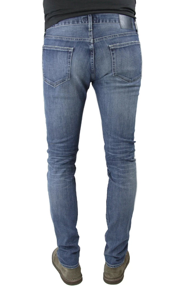 Back of S.M.N Studio's Hunter in Archer Men's Jeans - Slim fit jeans in a comfort Stretch Denim that has a medium wash highlighted by slight contrast fades and 3D whiskers