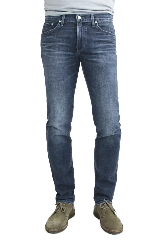 S.M.N Studio's Hunter in Atlas Men's Jeans - Dark to medium indigo wash made up in a comfort stretch denim with light fading and 3D whiskering to create a broken-in look