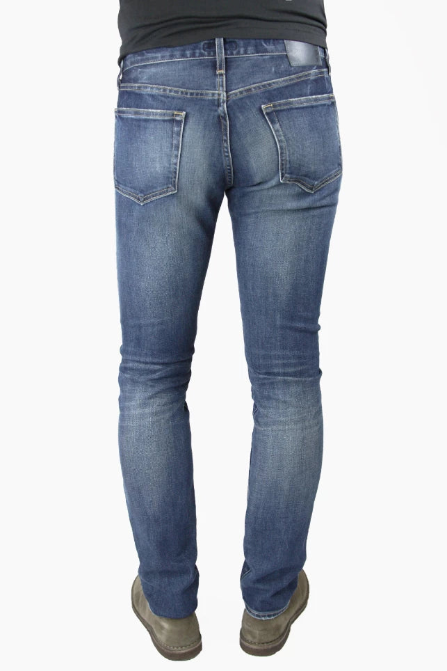 Back of S.M.N Studio's Hunter in Port Men's Jeans - Slim fit jean in a rugged vintage dark denim wash accented with 3d whiskering 