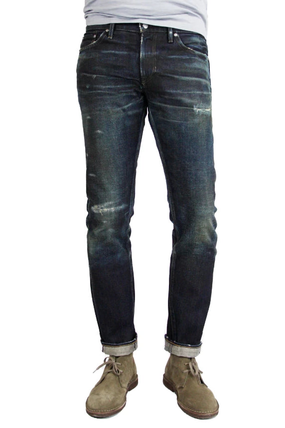 S.M.N Studio's Mercer in Deliverance Men's Jeans - A vintage inspired dark washed slim fit jean made in 100% Japanese cotton selvedge with fading and rips