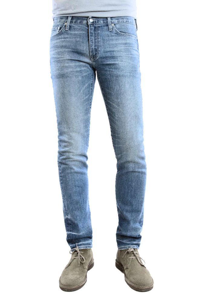 S.M.N Studio's Finn in Maison Men's Jeans - Tapered Slim Light blue comfort stretch premium denim with whiskering and fades for a natural lived in wash 
