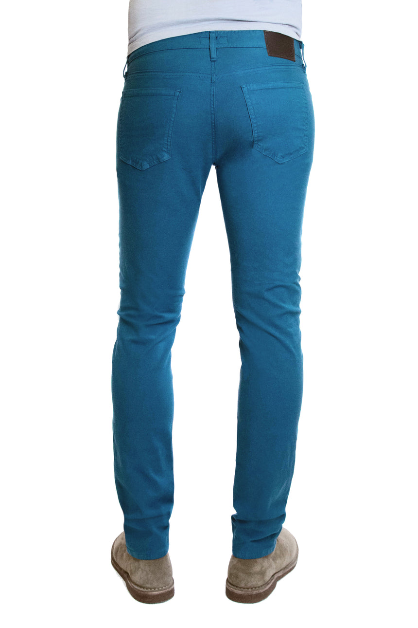 Back of S.M.N Studio's Hunter in Marine Men's Twill Pants. A slim stretch comfort twill pant in a teal color 
