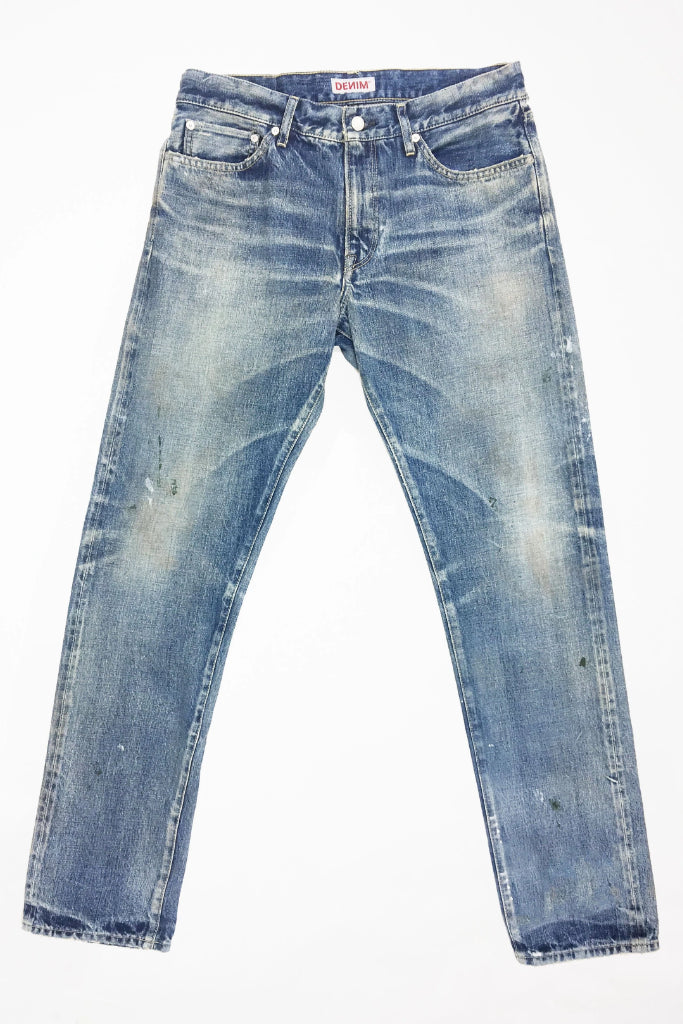 Flat image of S.M.N Studio's Mercer in Emerson Men's Jeans - Slim Fit Light vintage washed 100% Japanese Cotton selvedge denim with fading and splattering to create a truly workwear inspired pair
