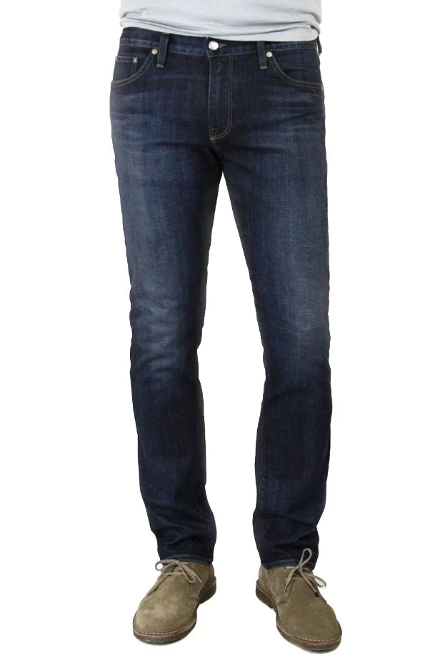 S.M.N Studio's Hunter in Bowery Men's Jeans. Slim dark blue washed stretch jeans with lightly accenting contrast fades. 